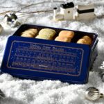 雪景色のホテル外観をお洒落に描いた限定デザイン「オリジナル缶入りフレーバークッキー“冬缶”」