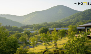 アーバネット旧軽井沢にタイムシェア別荘用地取得を示す、軽井沢の静かな自然と高級感漂うリゾート風景。